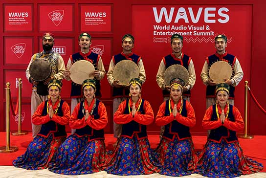 Members of Dynamic Flickers Dance Academy in traditional Indian costumes